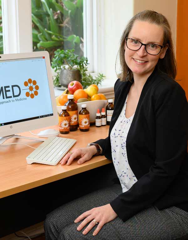 Free 20 minute consult at Remed - A woman having a consult with a naturopath